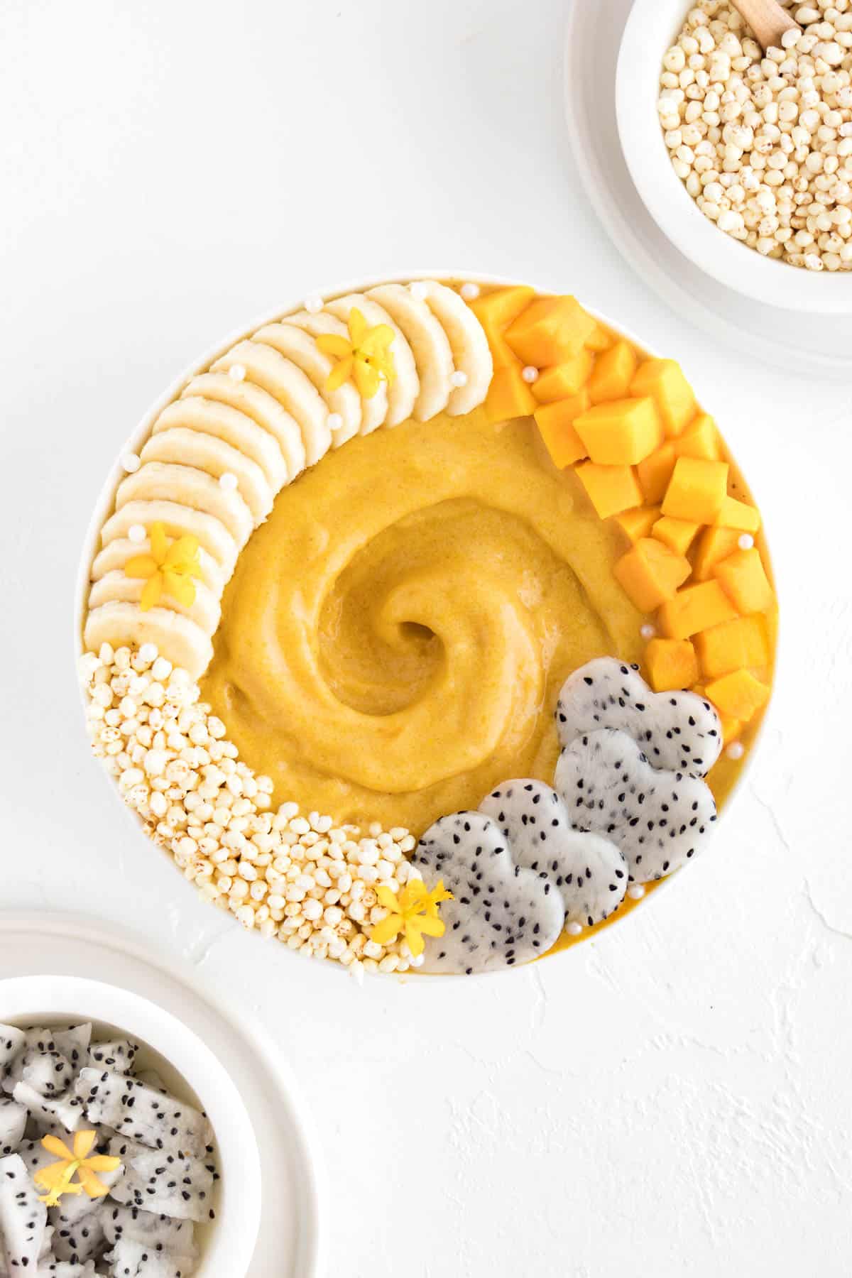 mango banana smoothie in a white bowl