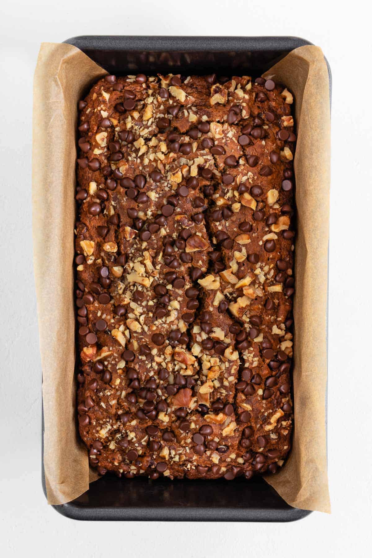 baked vegan gluten-free banana bread inside a loaf pan