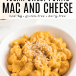 vegan sweet potato mac and cheese in a white bowl with black text