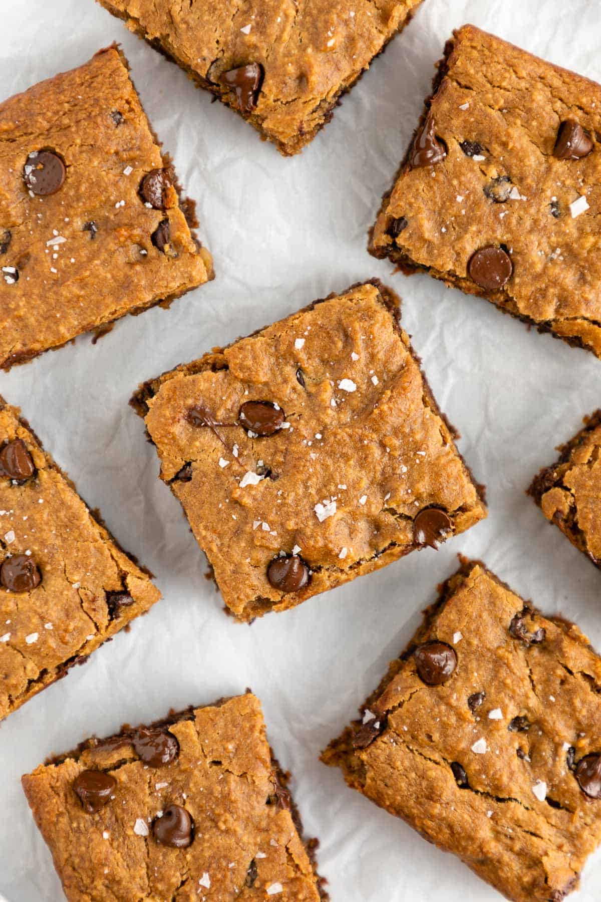 hand holding a chocolate chip banana blondie bar