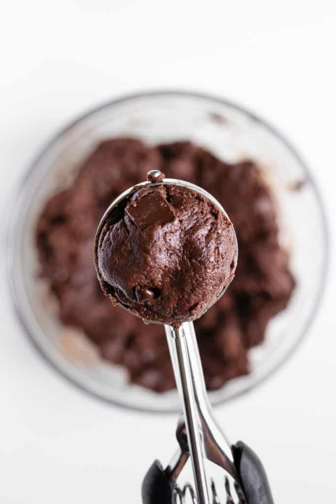 vegan double chocolate chip cookie dough inside a cookie scoop