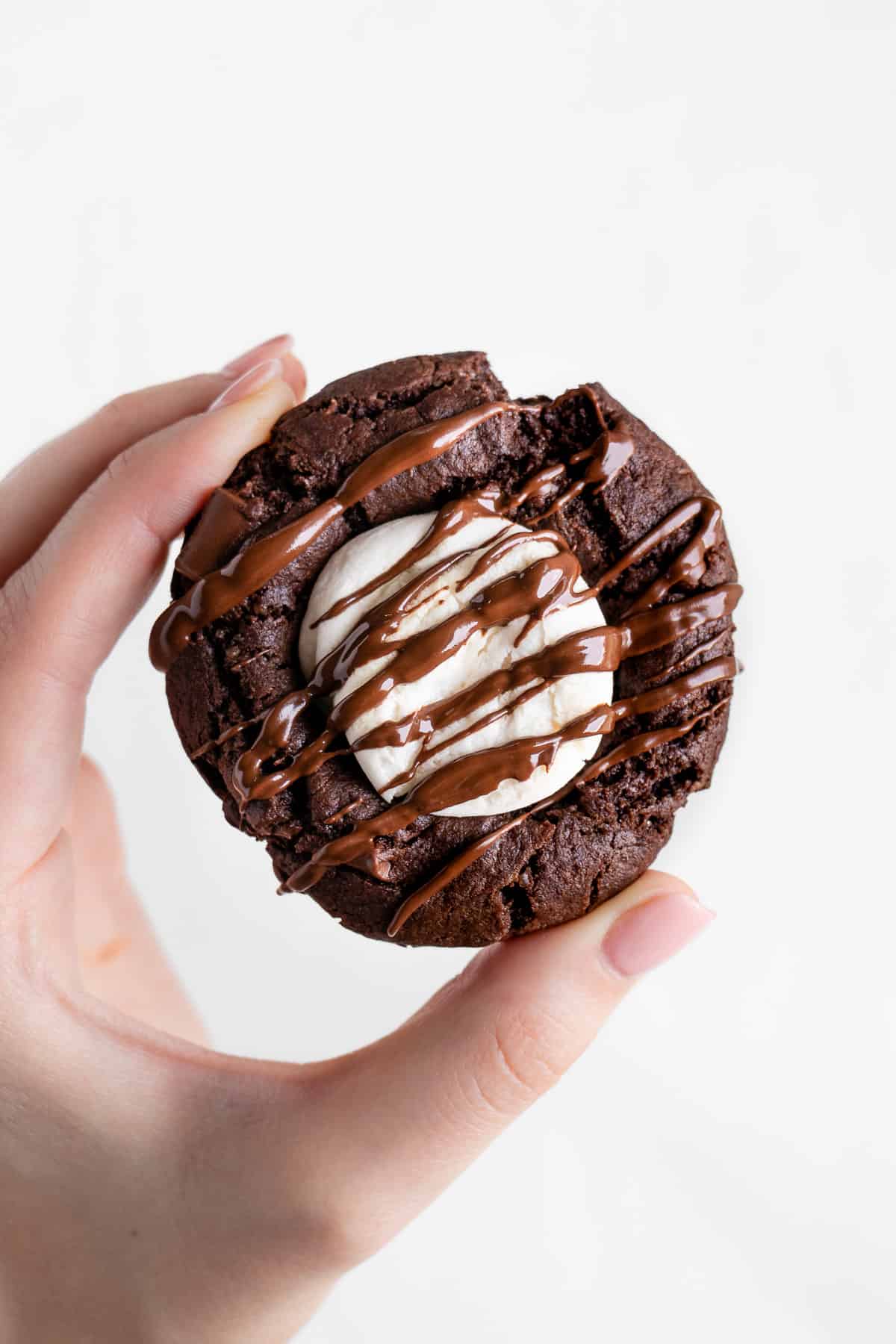 hand holding a vegan hot chocolate cookie
