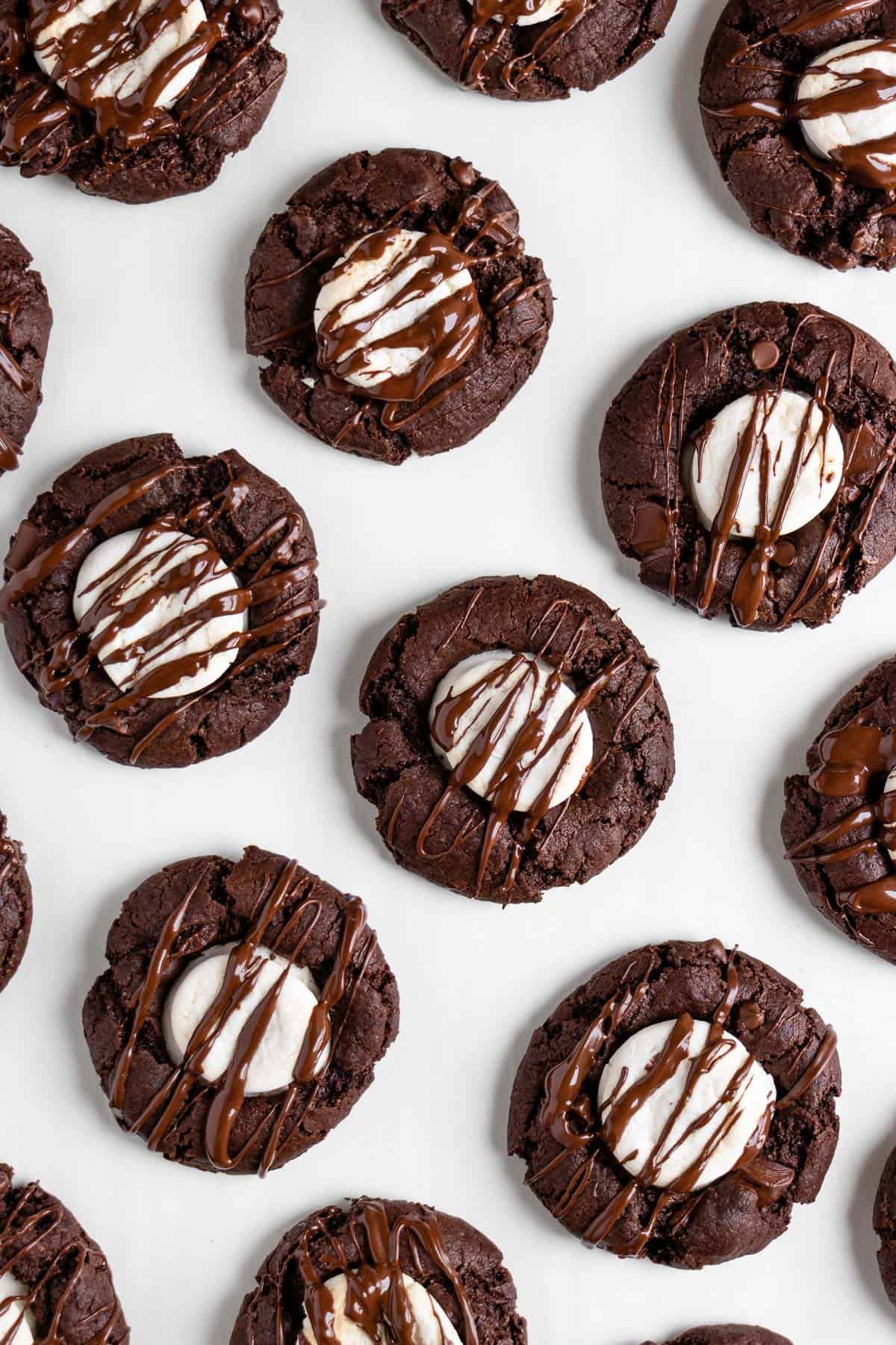 vegan hot cocoa cookies on a white surface