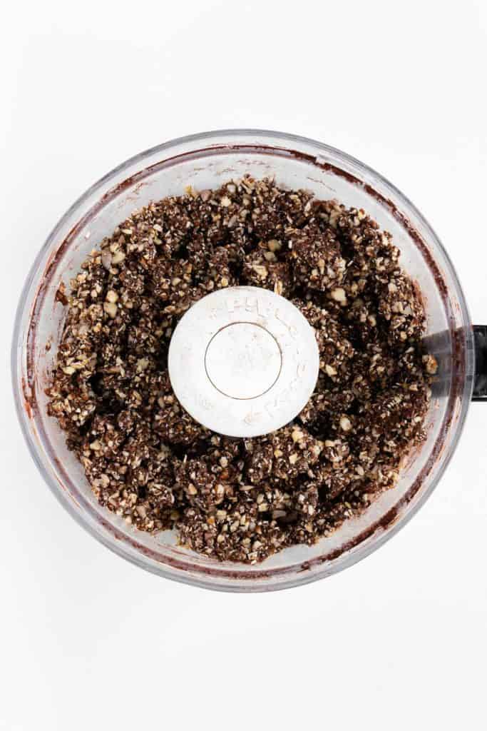 crumbled raw granola inside a food processor