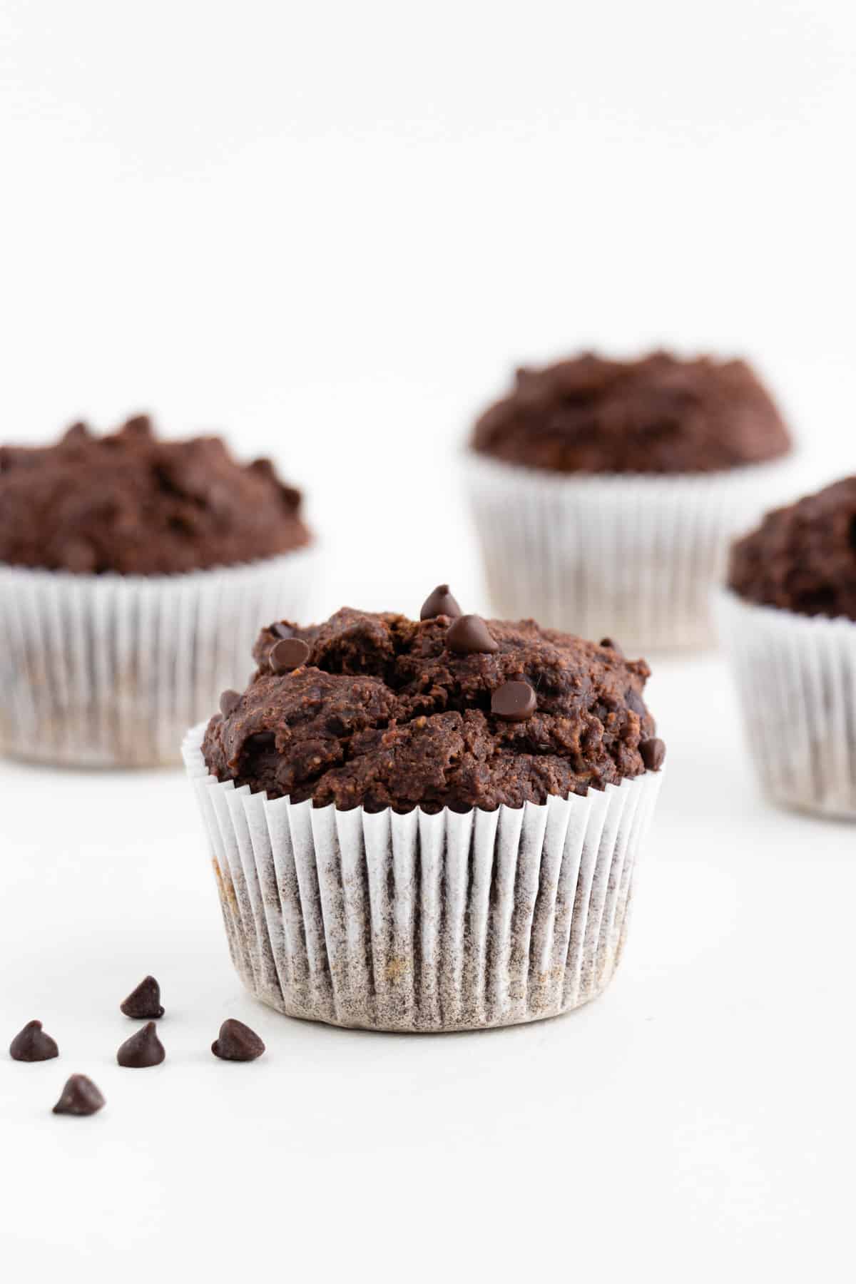 four vegan double chocolate banana muffins