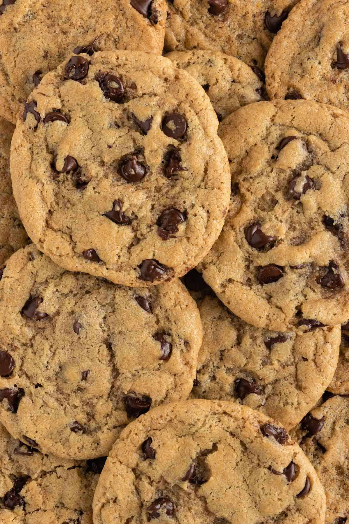 a pile of vegan chocolate chip cookies