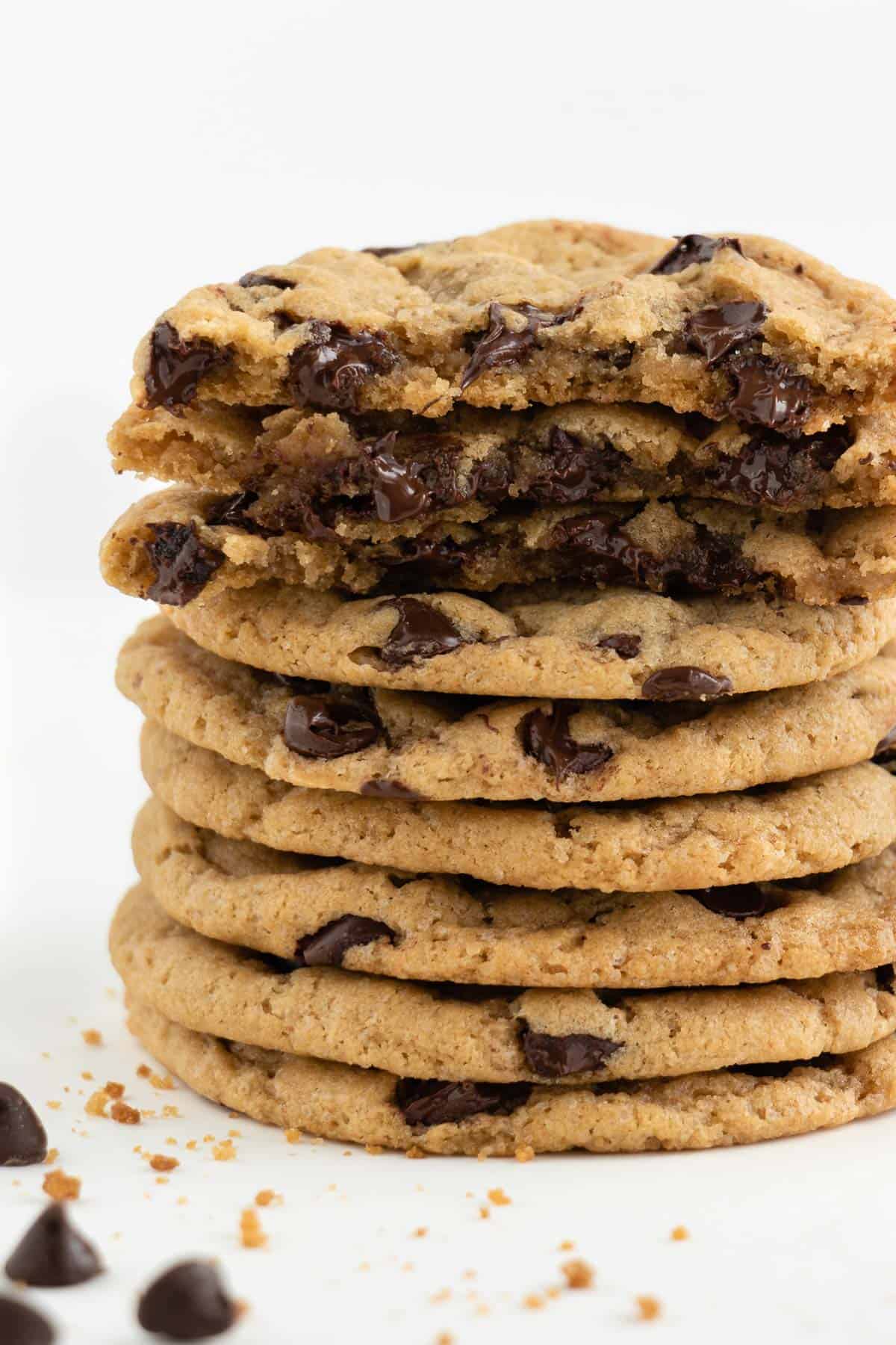 a stack of gooey vegan chocolate chip cookies