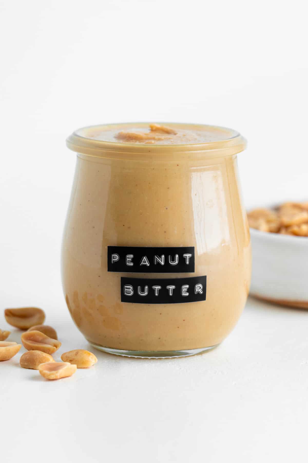 homemade peanut butter in a small glass jar