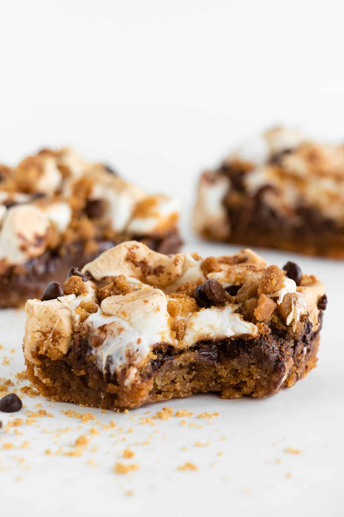 a vegan s'mores bar with a bite taken out of the center