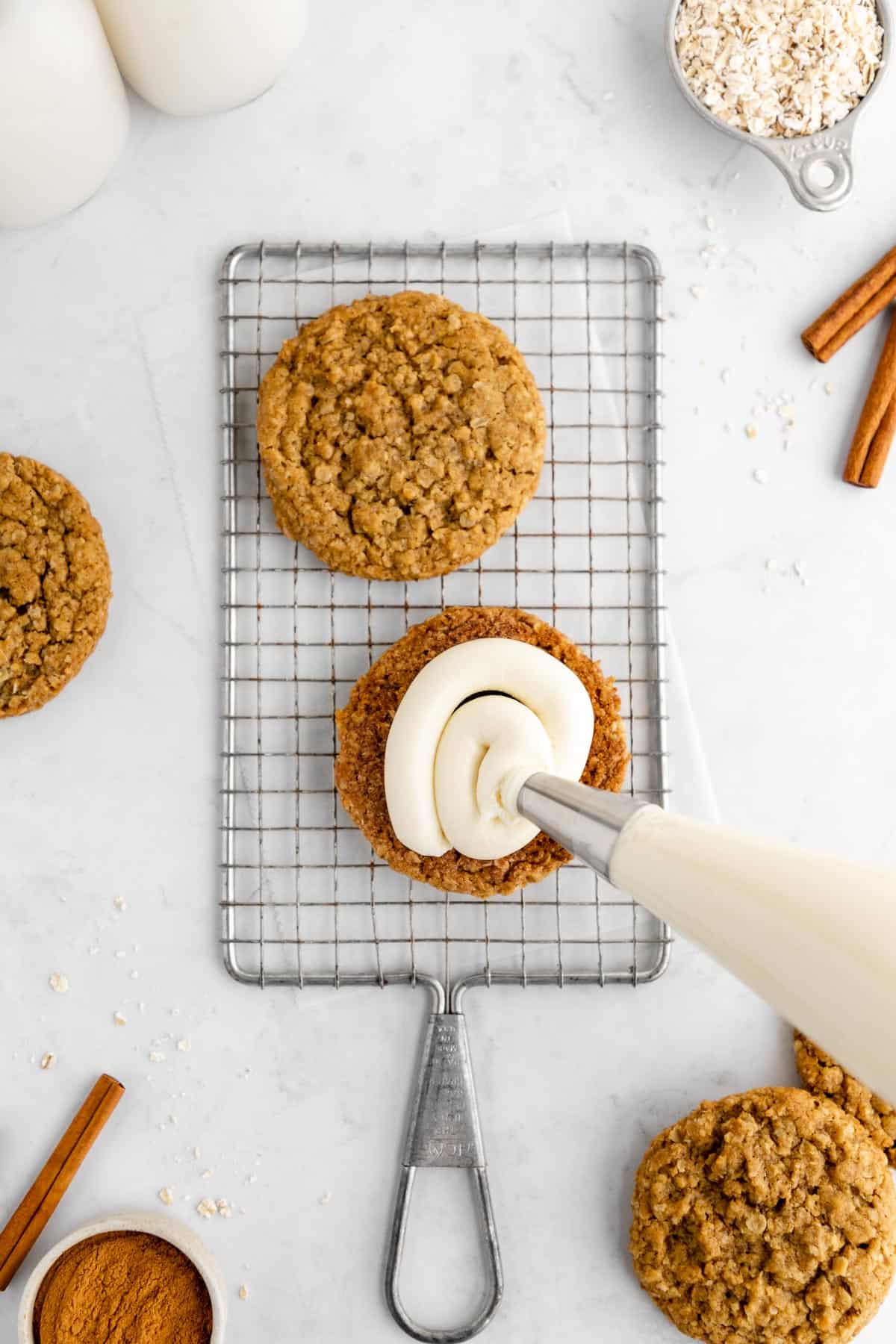 oatmeal cookies topped with vanilla frosting
