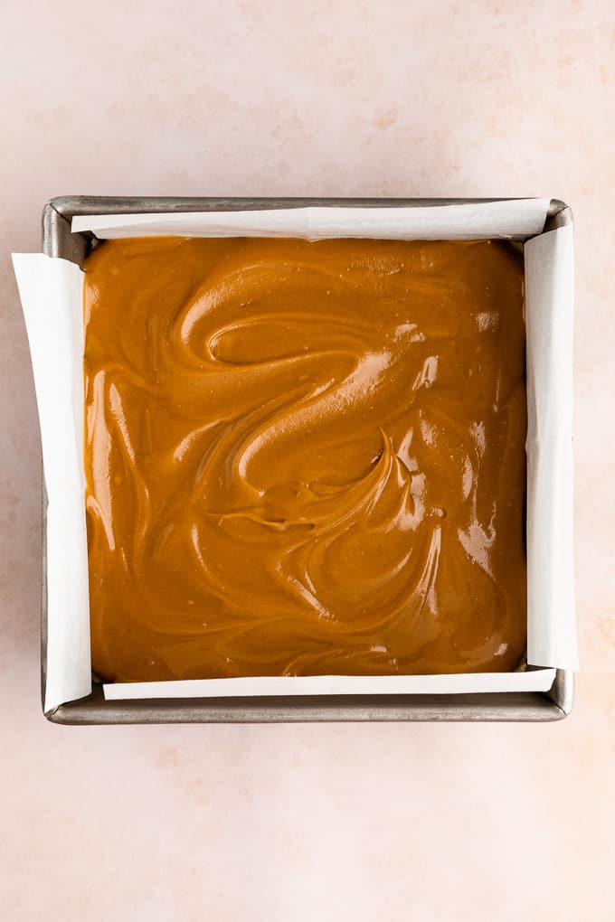 healthy vegan caramel spread across a square baking dish