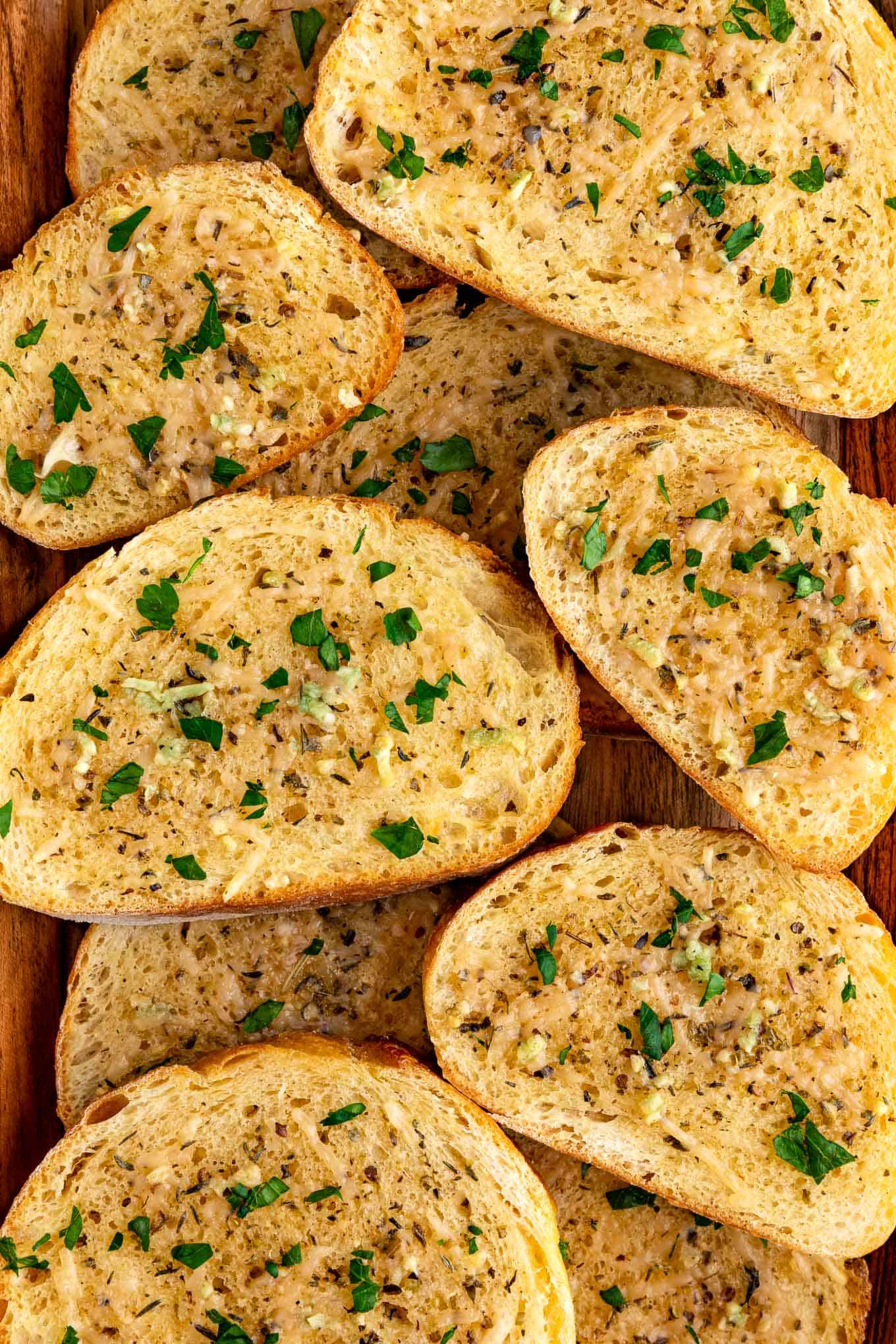 close up image of vegan garlic bread with parmesan