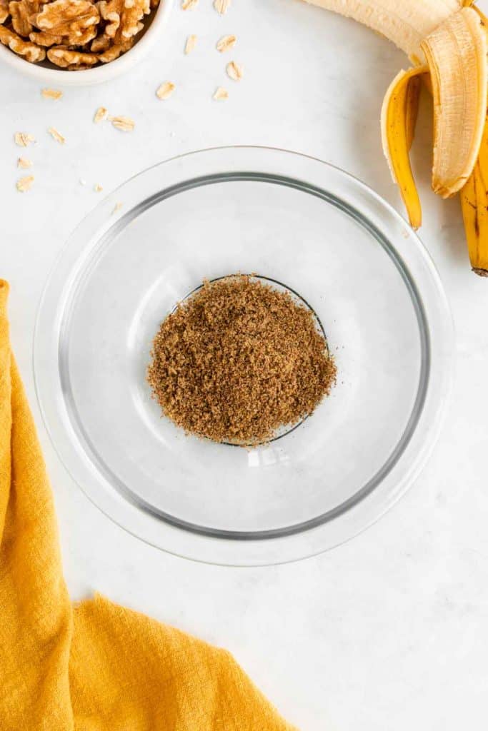 ground flaxseed in a glass mixing bowl