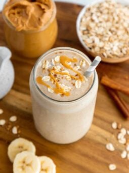 an overhead photo of an oatmeal smoothie with peanut butter