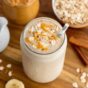 an overhead photo of an oatmeal smoothie with peanut butter