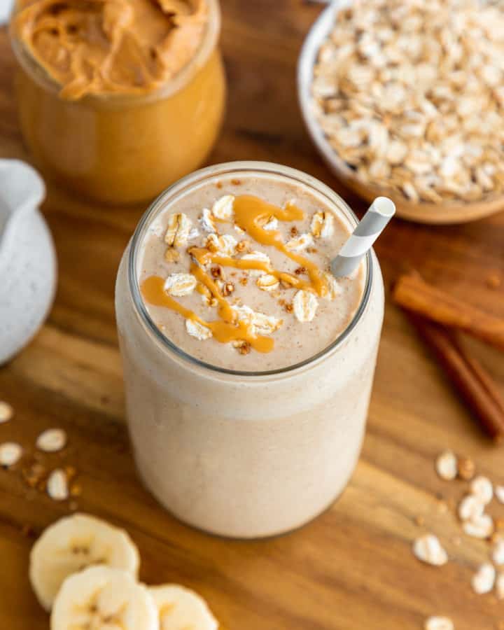 an overhead photo of an oatmeal smoothie with peanut butter