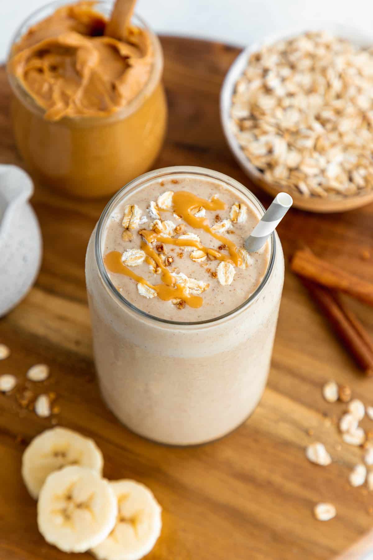 an overhead photo of an oatmeal smoothie with peanut butter