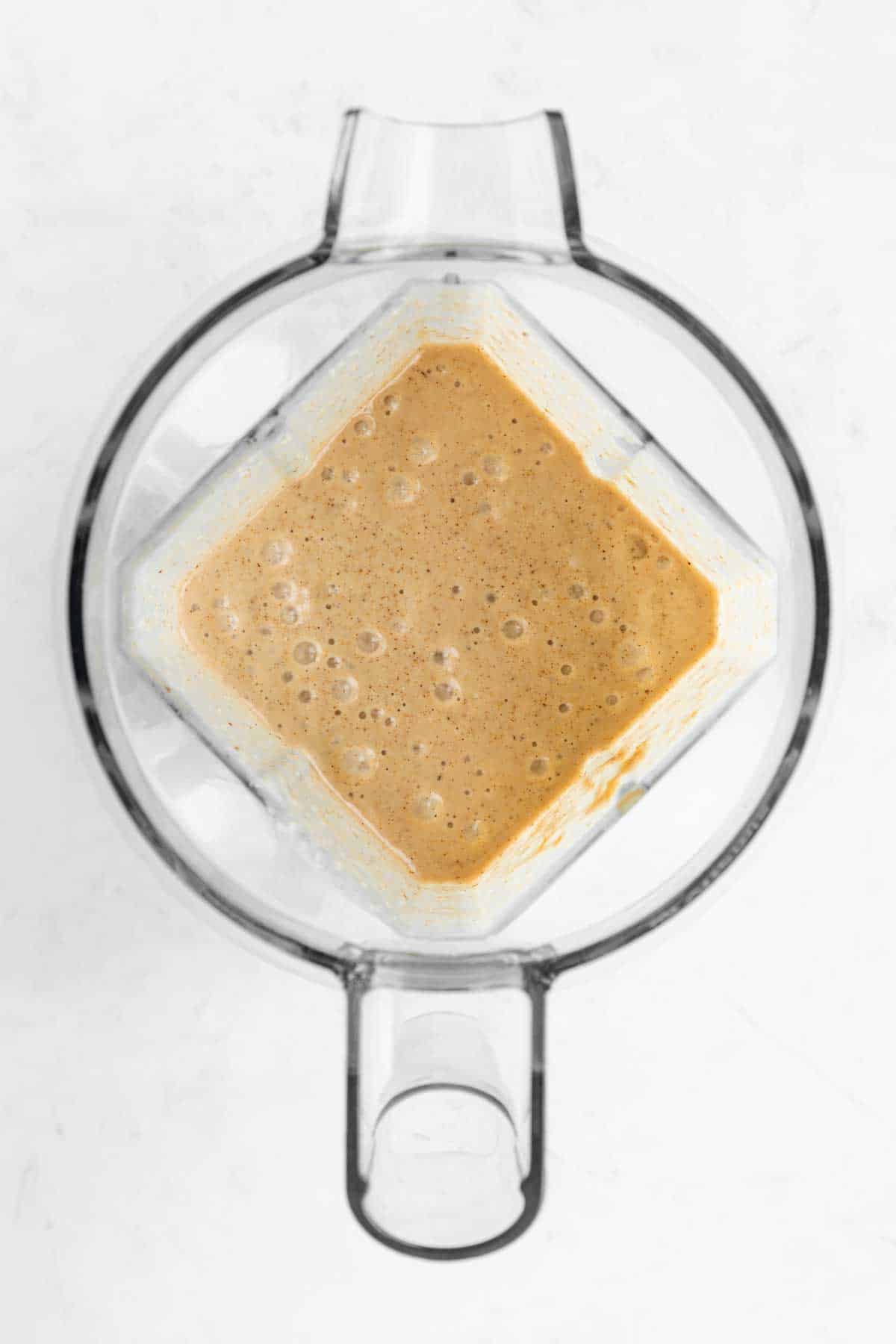 an oatmeal smoothie blended inside a vitamix blender