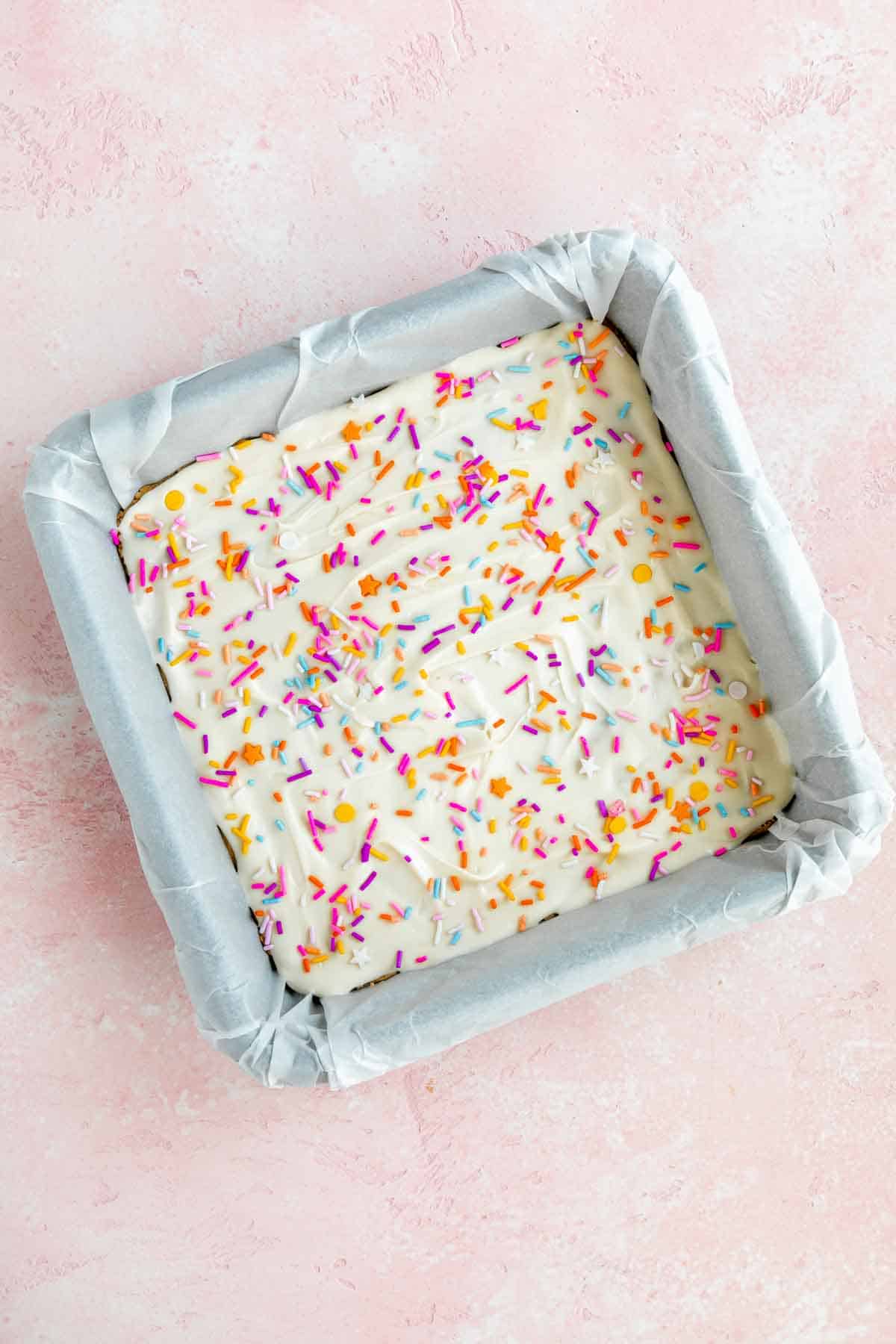 birthday cake protein bars inside a baking dish