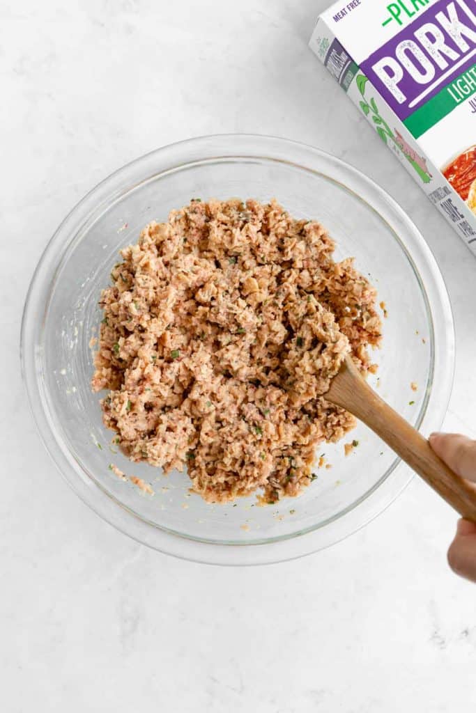 mixing jada brands porkless mix in a bowl