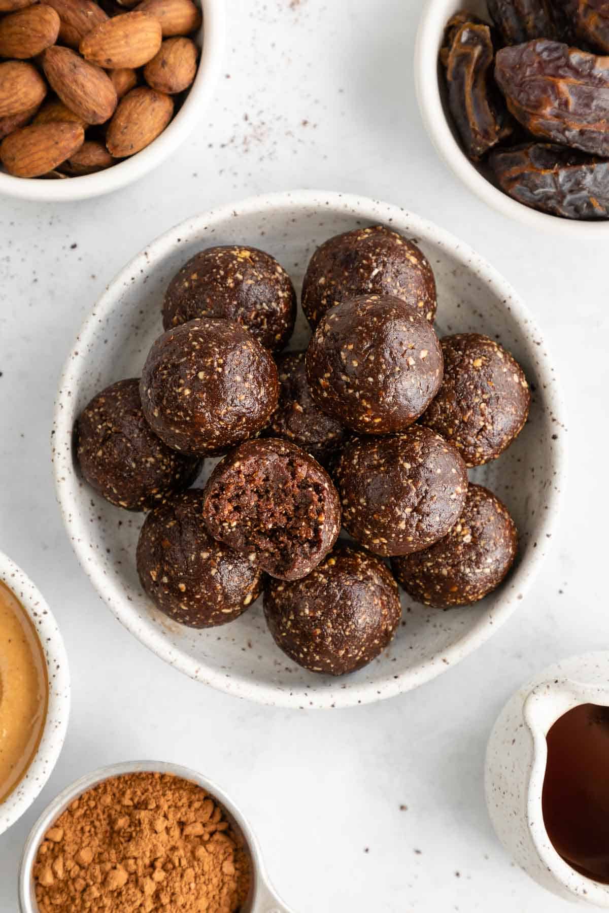 mocha energy balls inside a ceramic bowl