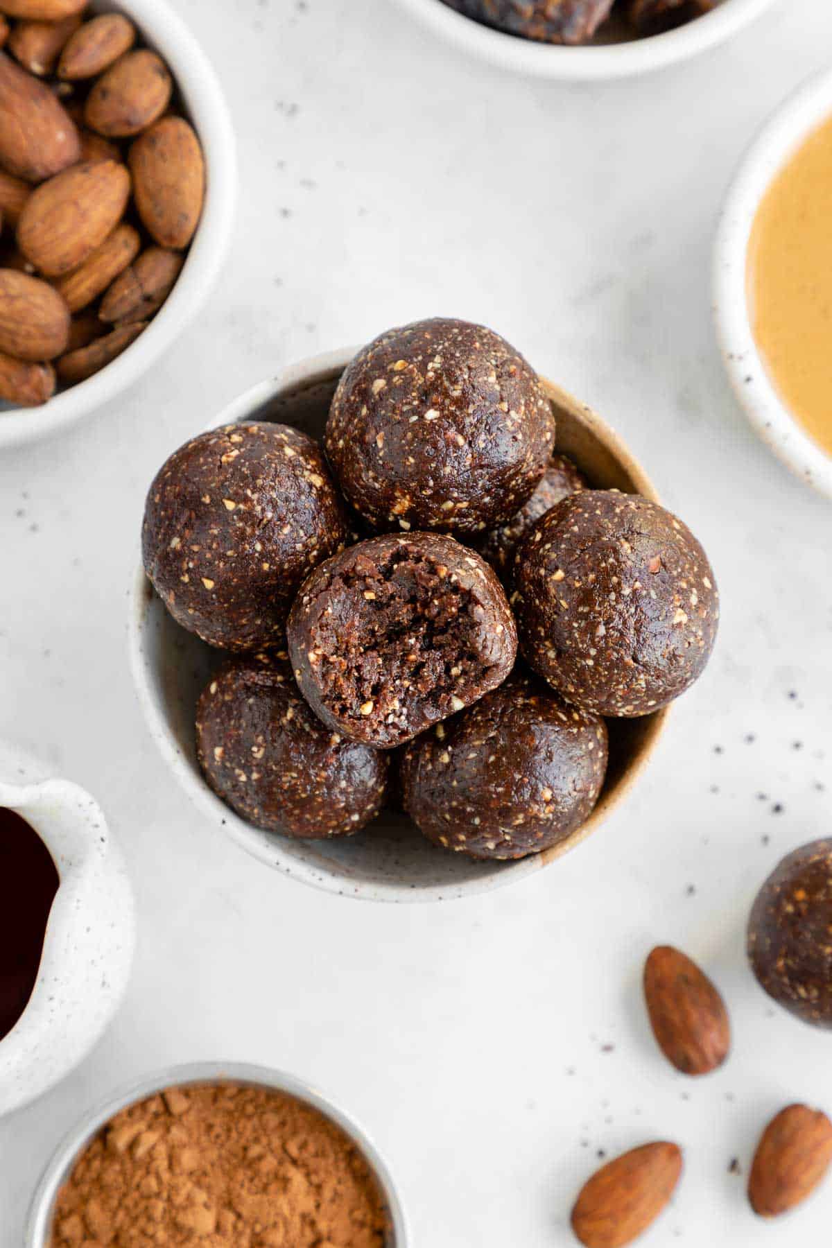 mocha energy balls inside a small ceramic bowl