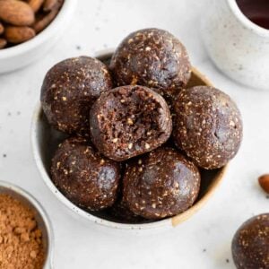 a small ceramic bowl filled with mocha energy balls