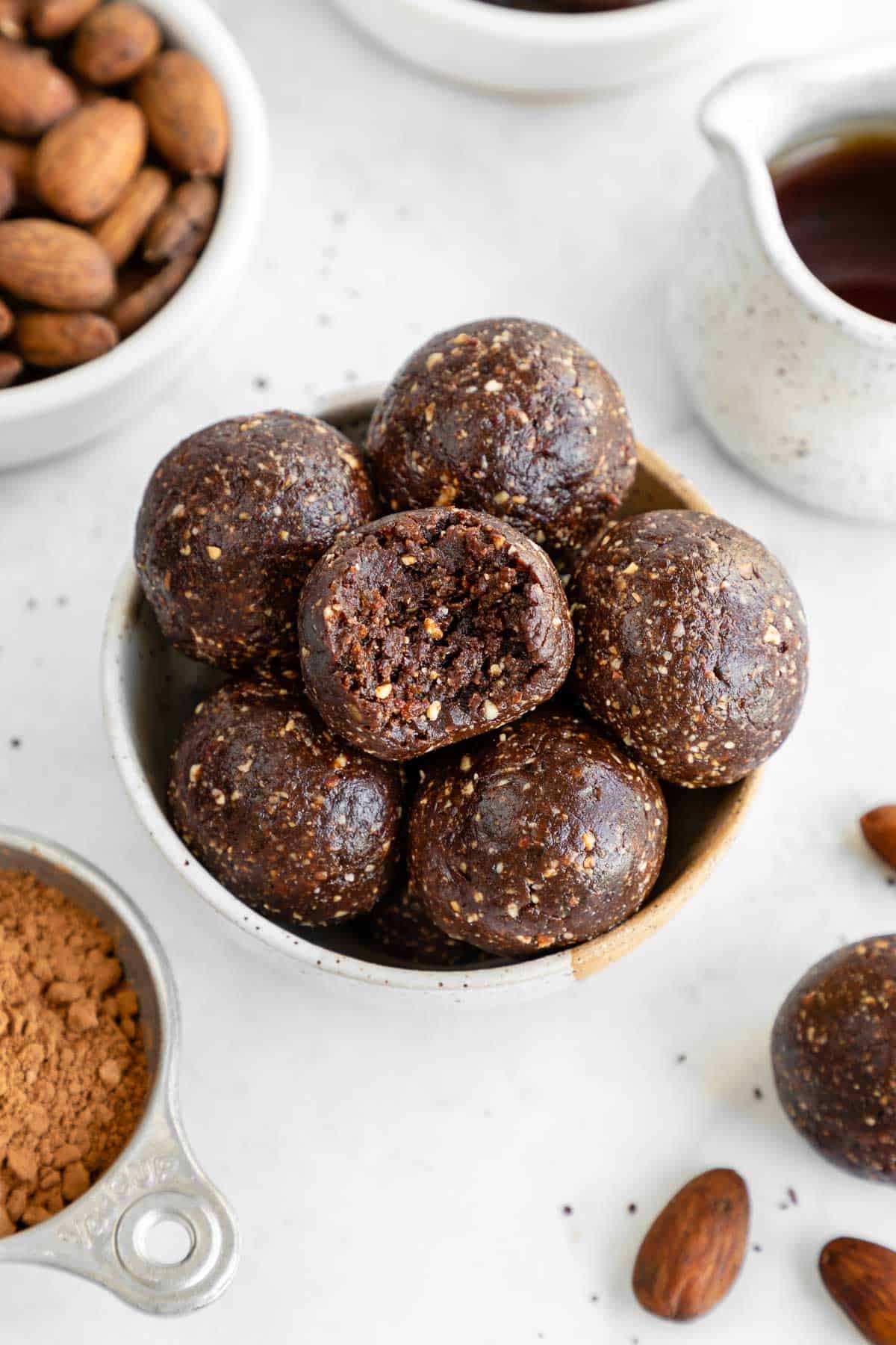 a small ceramic bowl filled with mocha energy balls