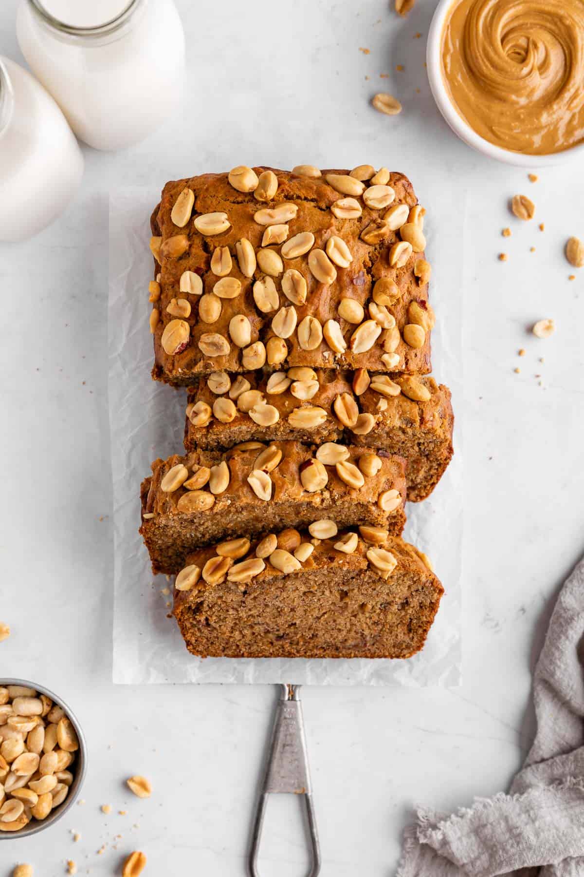 a sliced loaf of vegan peanut butter banana bread