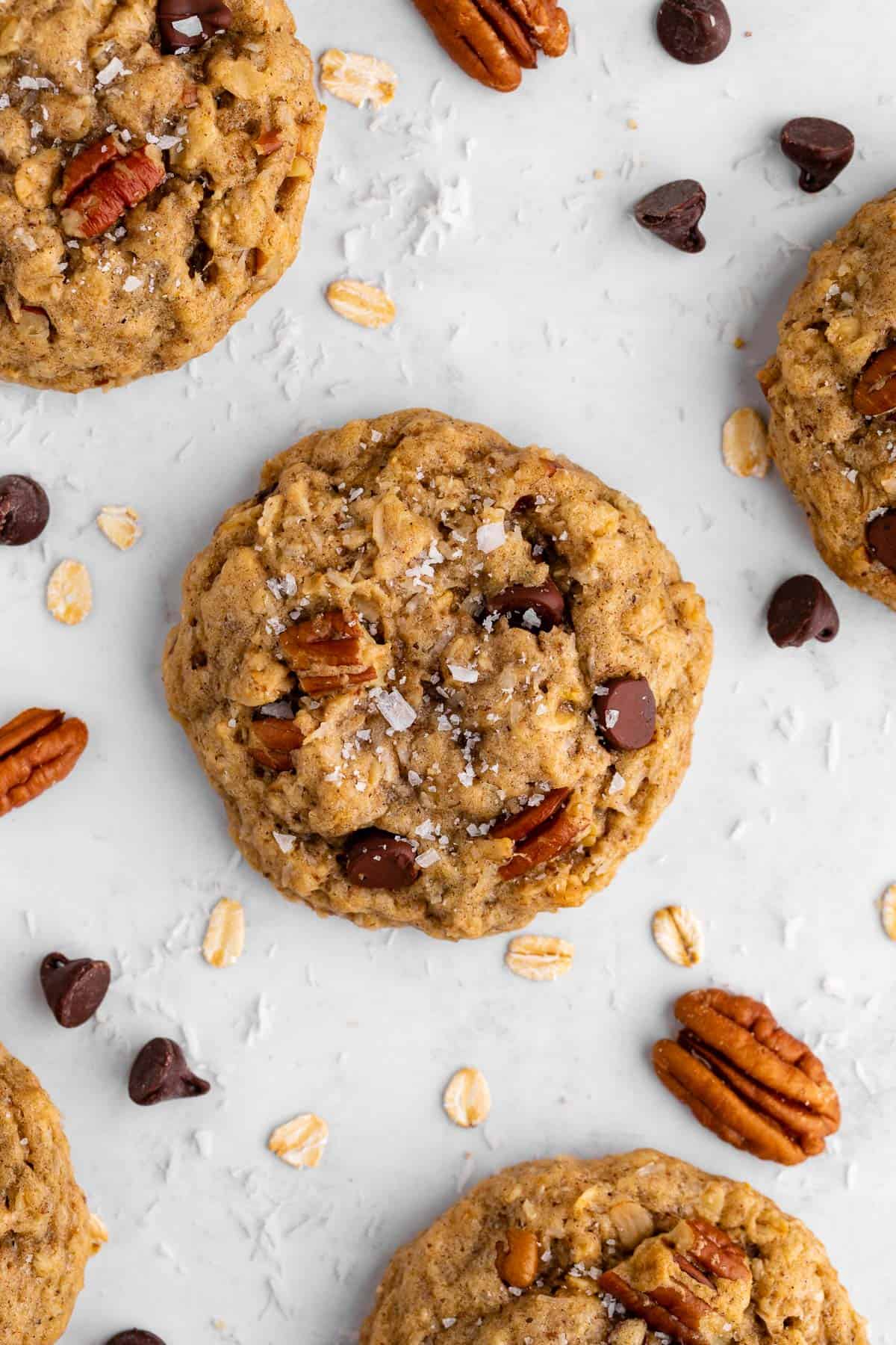 close up of vegan cowboy cookies with oatmeal, coconut, pecans, and chocolate chips