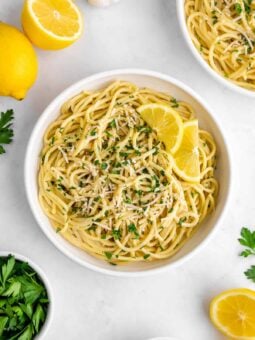 two bowls of creamy vegan lemon pasta with coconut milk