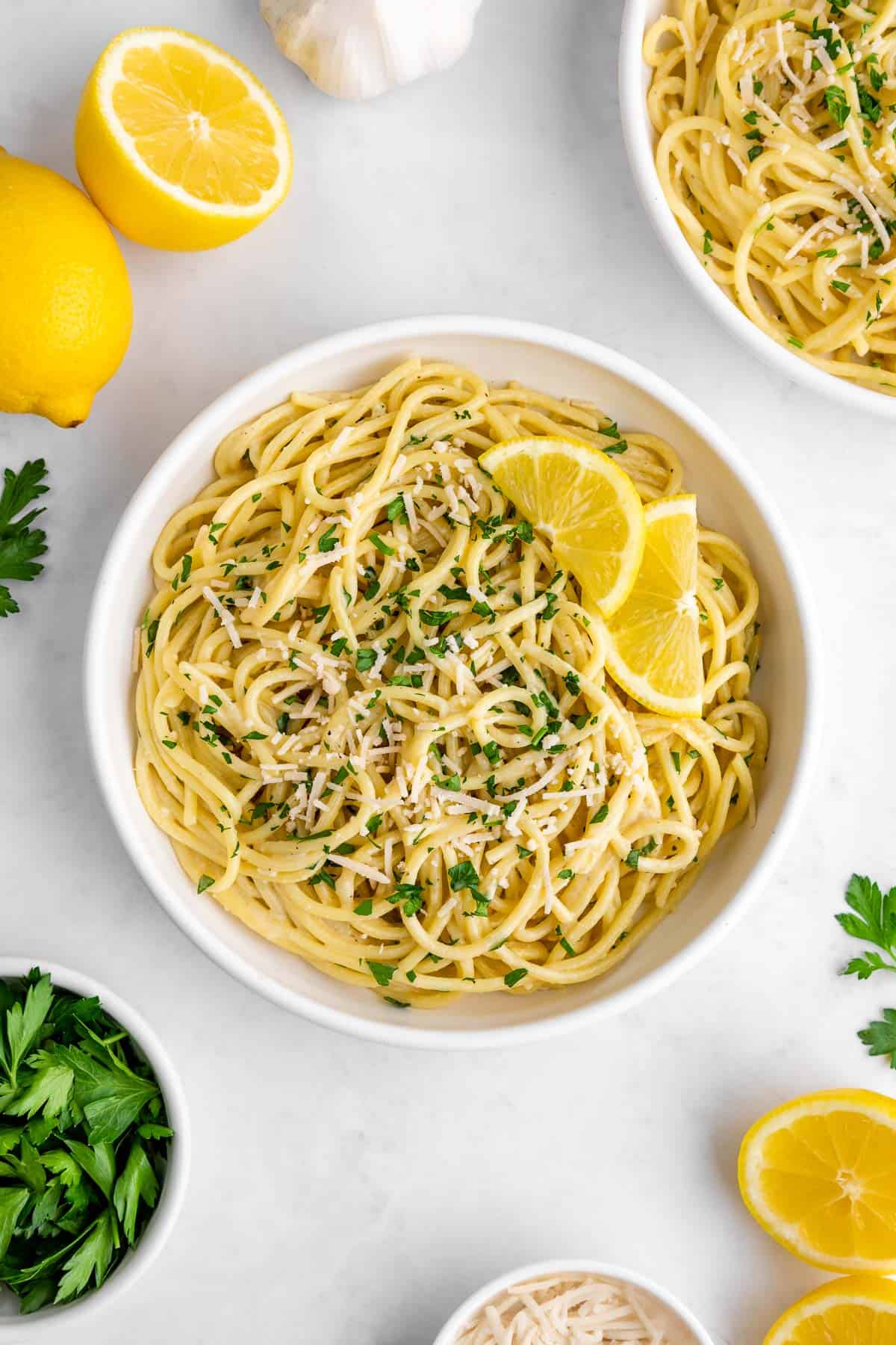 two bowls of creamy vegan lemon pasta with coconut milk