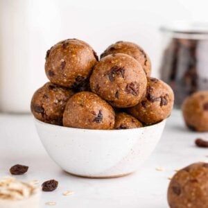 a small speckled bowl filled with oatmeal raisin energy bites