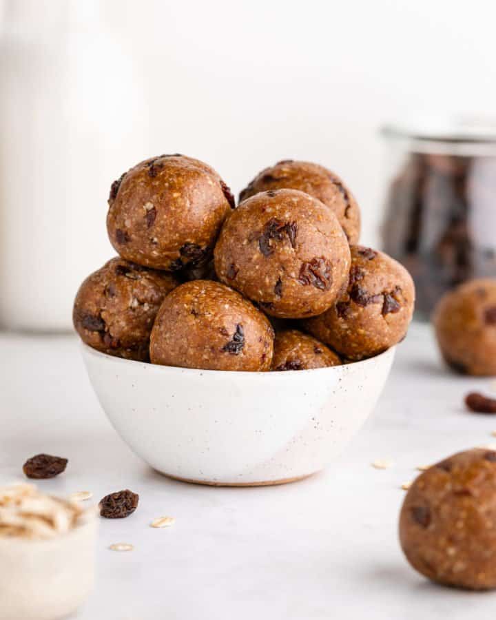 a small speckled bowl filled with oatmeal raisin energy bites