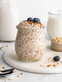 a jar of vegan basic overnight oats with chia seeds, yogurt, and almond milk