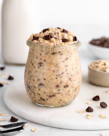 a jar of vegan cookie dough overnight oats with chocolate chips