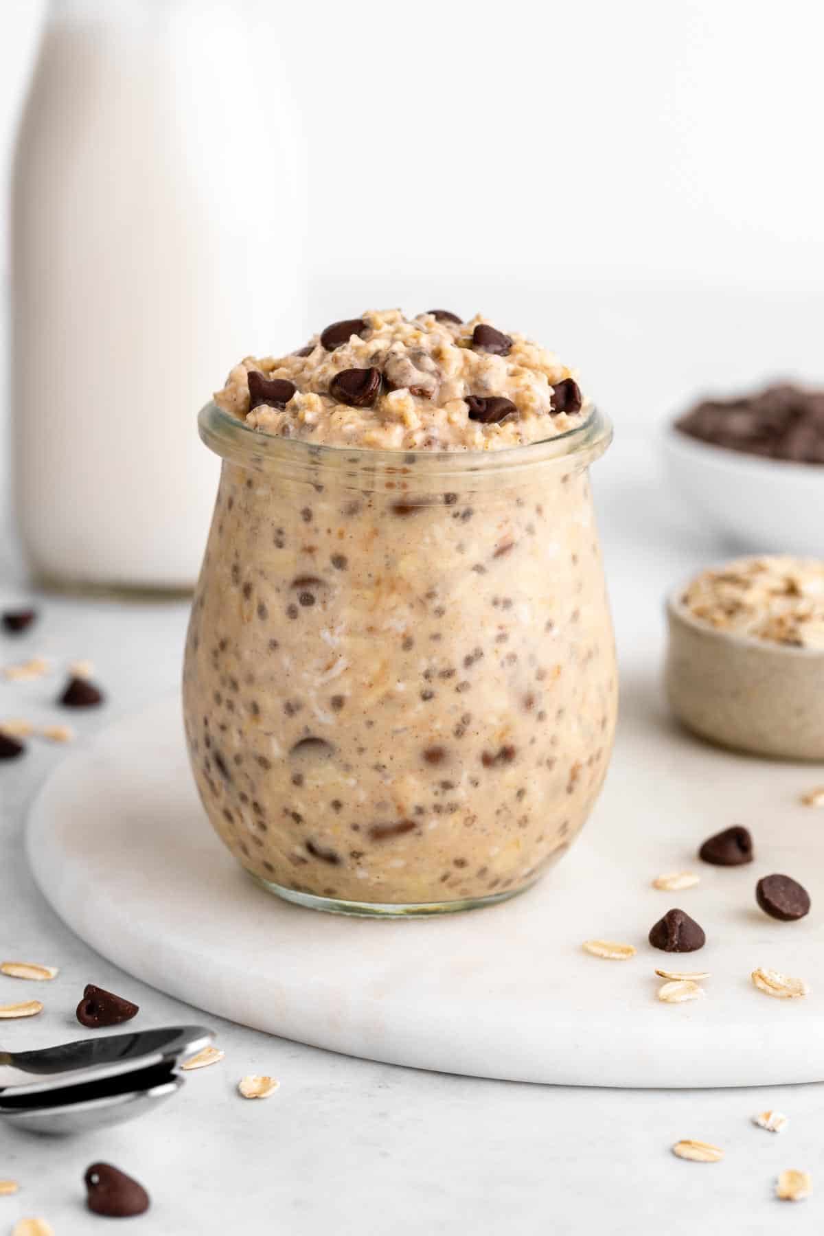 a jar of vegan cookie dough overnight oats with chocolate chips
