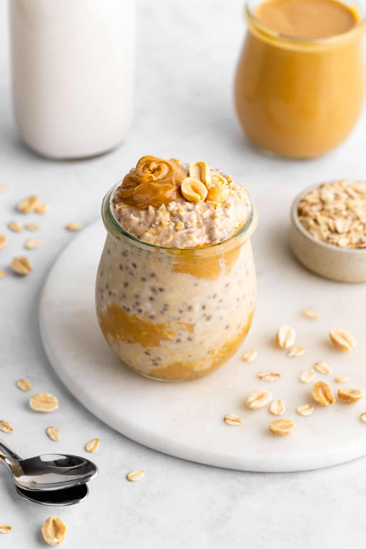 vegan peanut butter overnight oats with chia seeds and yogurt in a jar