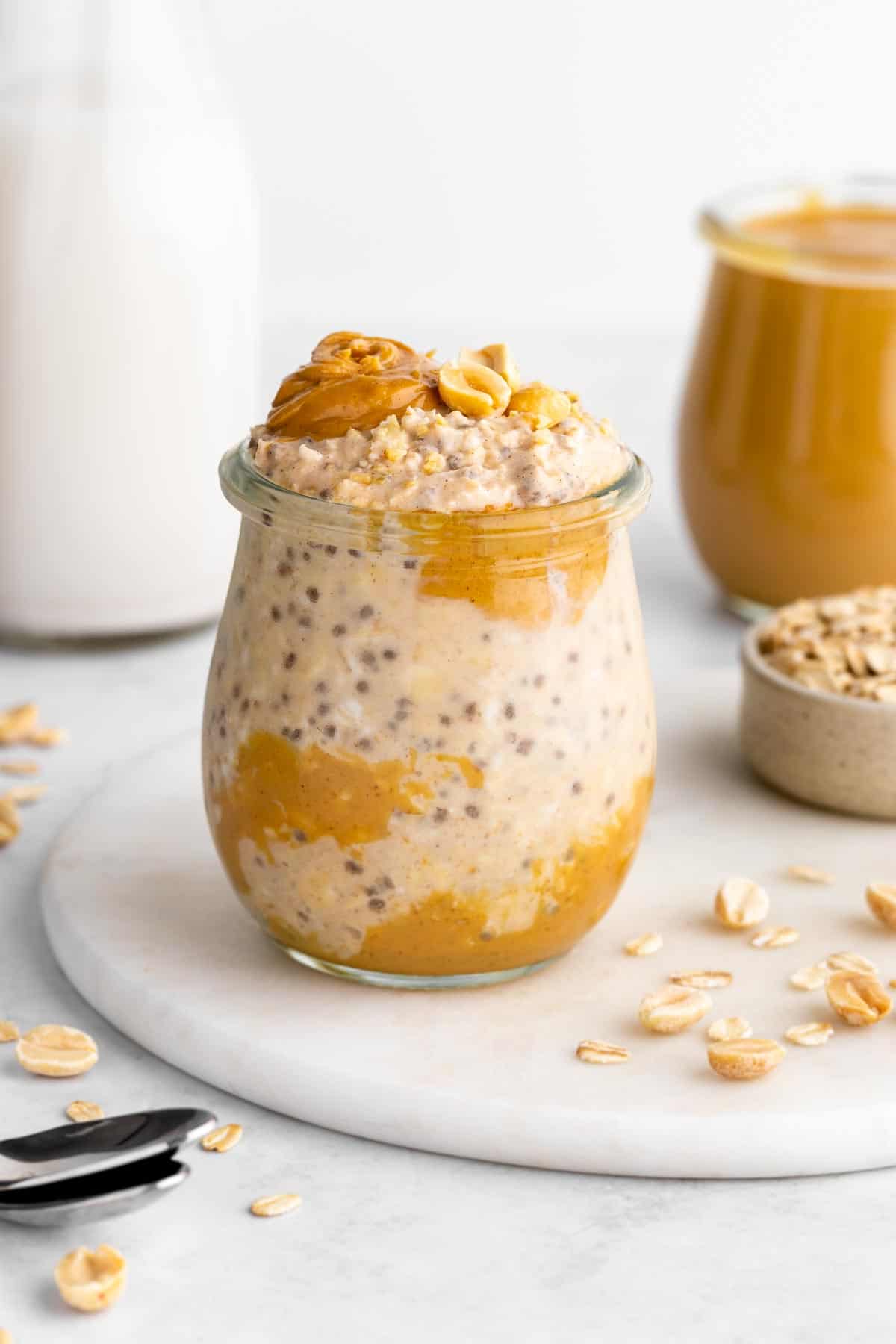 vegan peanut butter overnight oats with yogurt and chia seeds in a jar