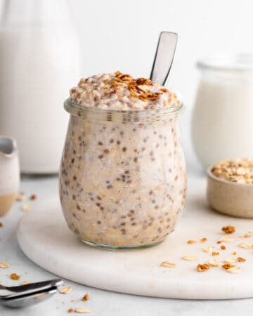 vegan vanilla overnight oats with yogurt and chia seeds inside a jar