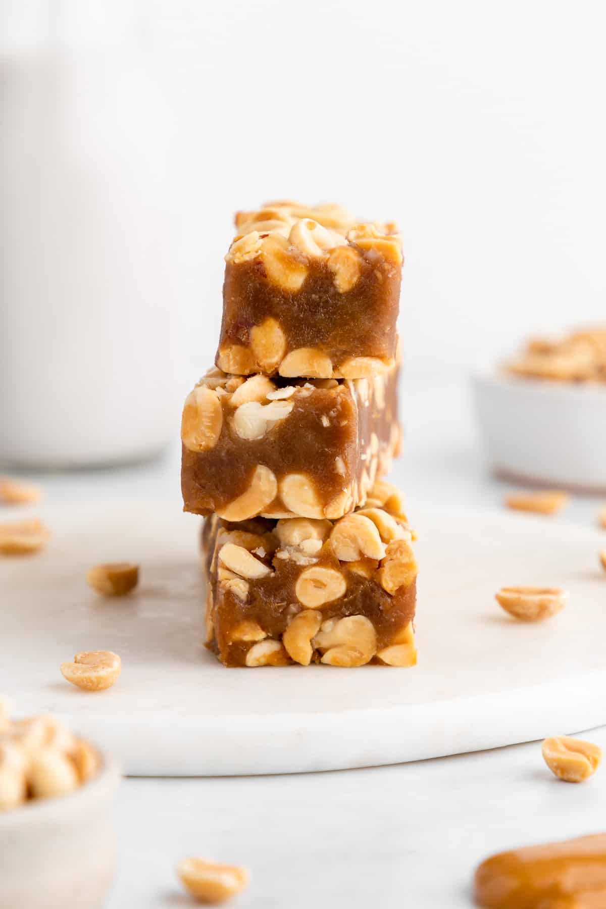 a stack of three vegan homemade payday bars