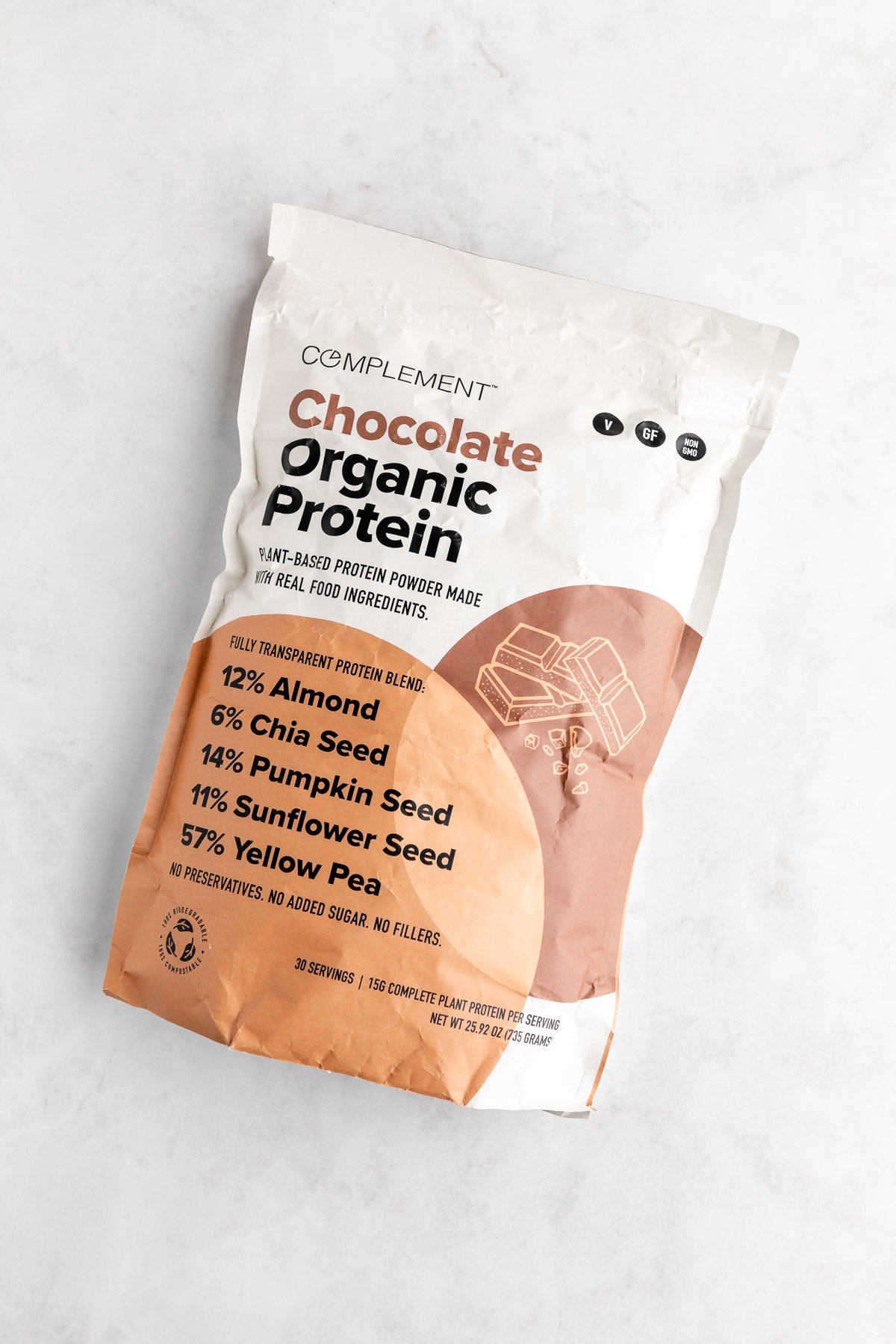 a bag of complement organic chocolate protein powder