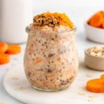 carrot cake overnight oats in a jar with yogurt and chia seeds