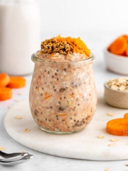carrot cake overnight oats in a jar with yogurt and chia seeds