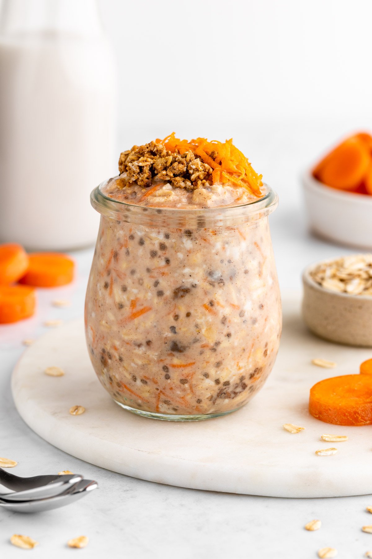 carrot cake overnight oats in a jar with yogurt and chia seeds