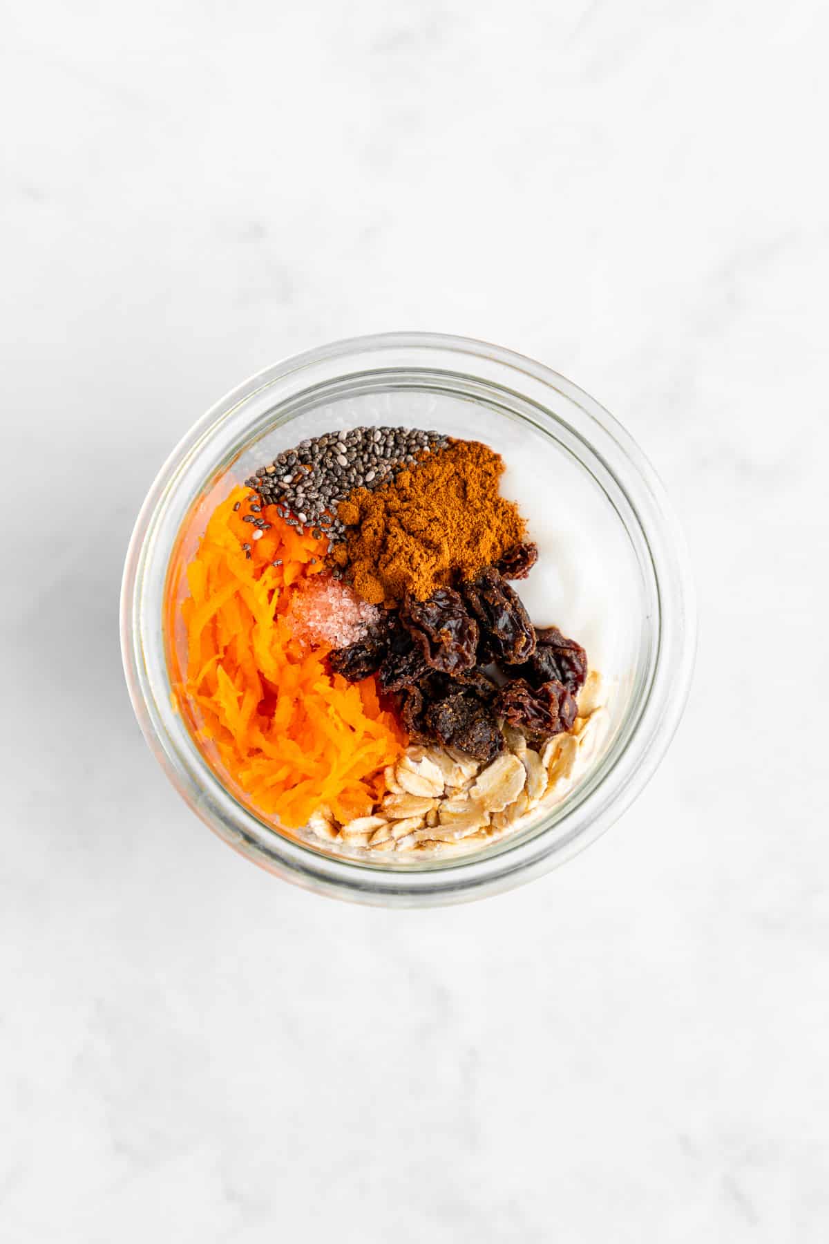 ingredients for carrot cake overnight oats in a mason jar