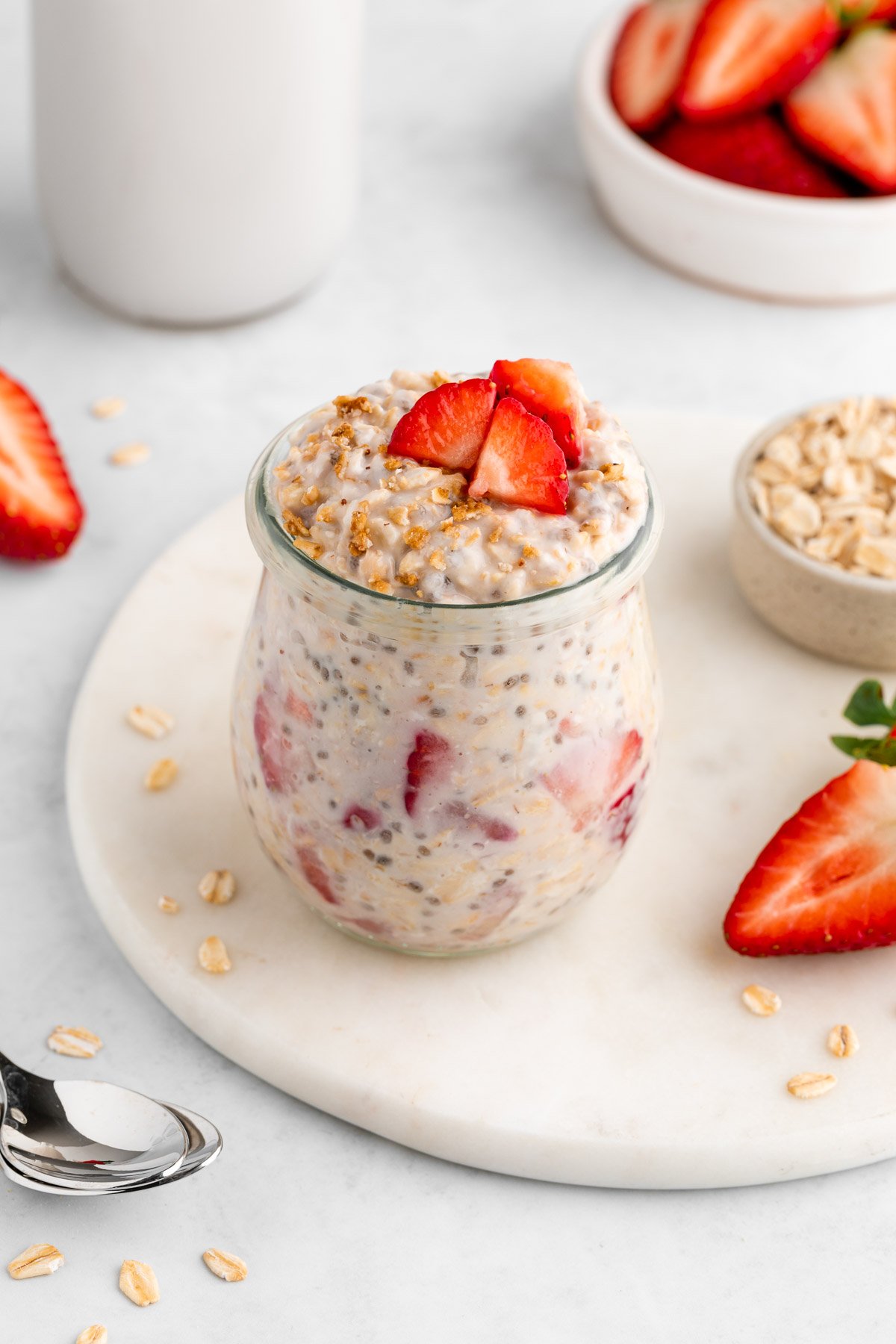 strawberries and cream overnight oats in a jar