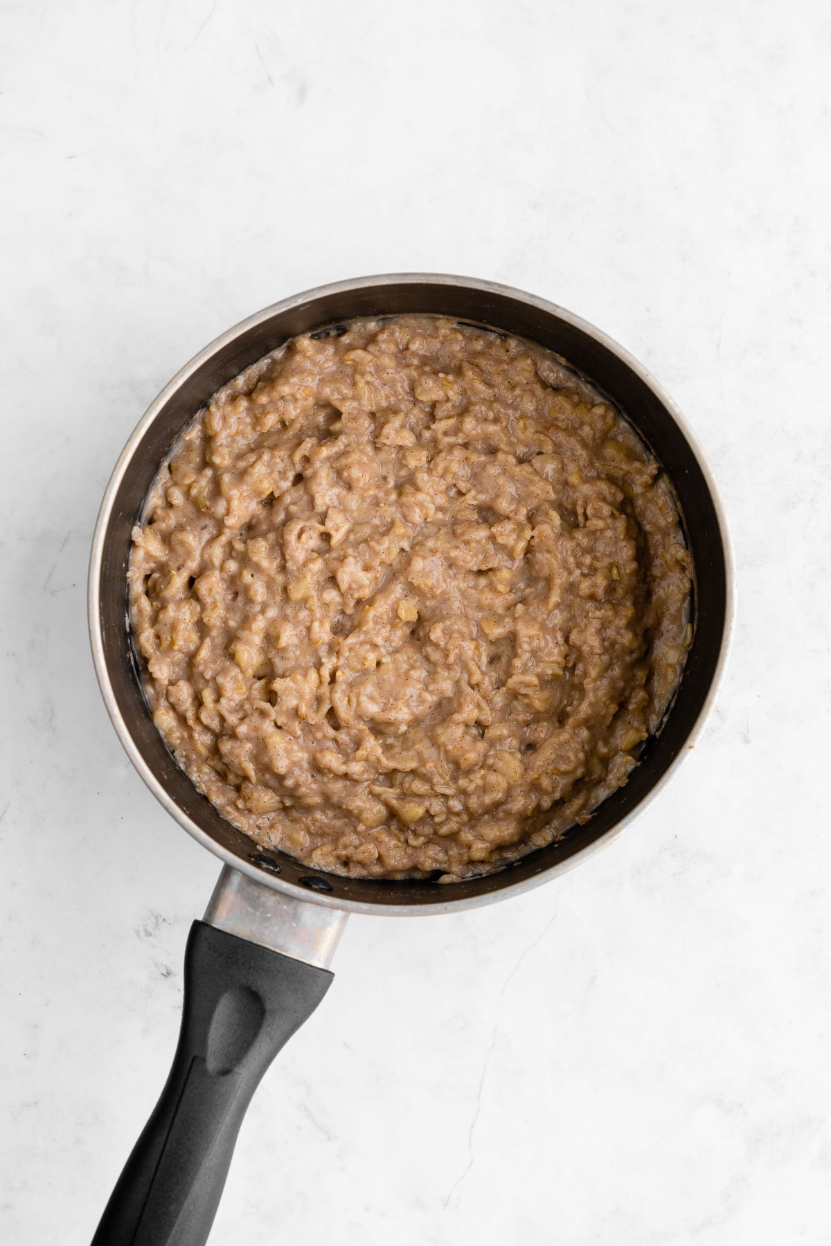 banana oatmeal inside a black pot