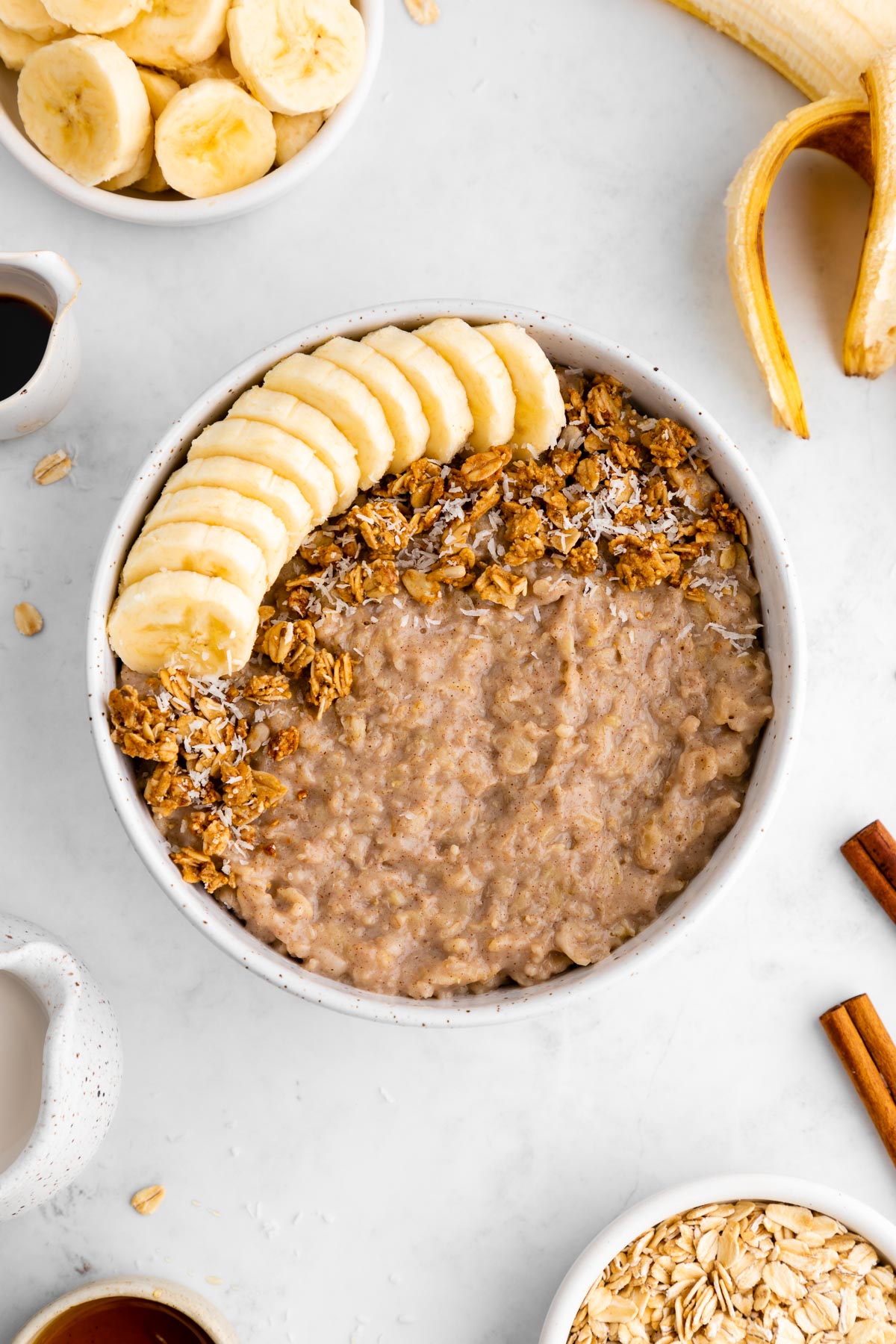 vegan banana oatmeal inside a speckled ceramic bowl