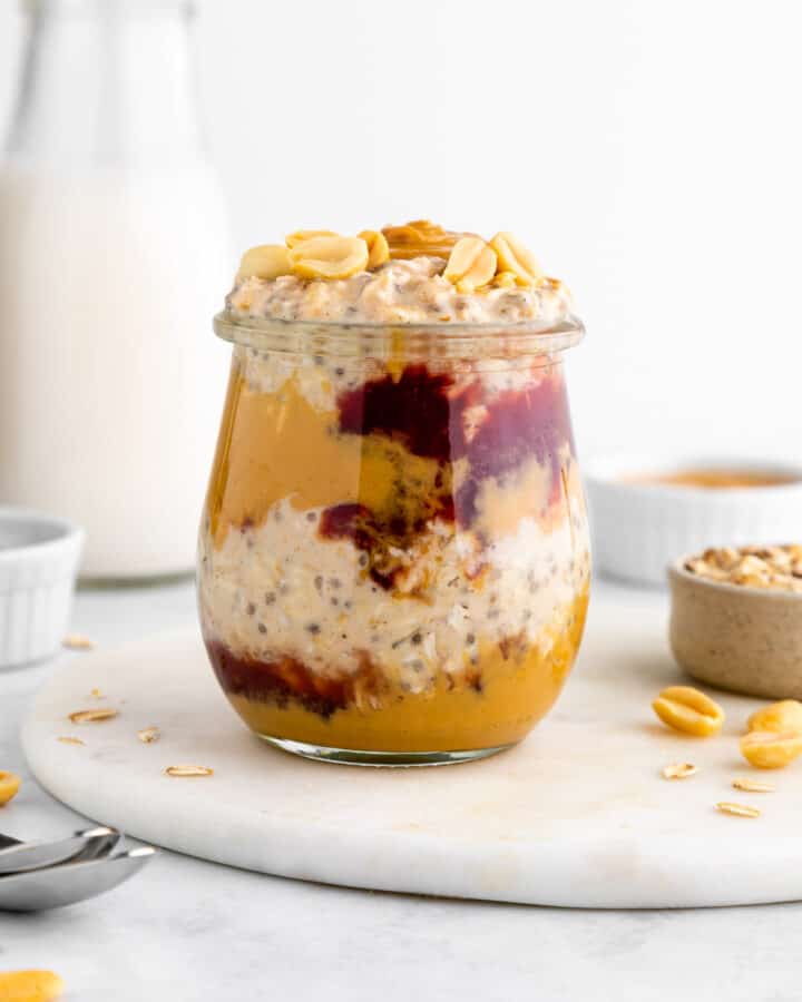 peanut butter and jelly overnight oats inside a glass weck jar
